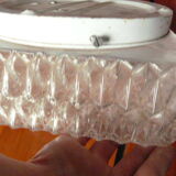 Square ceiling light resists glass