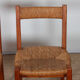 Suite de 6 chaises paillées en orme massif, travail français, 1950