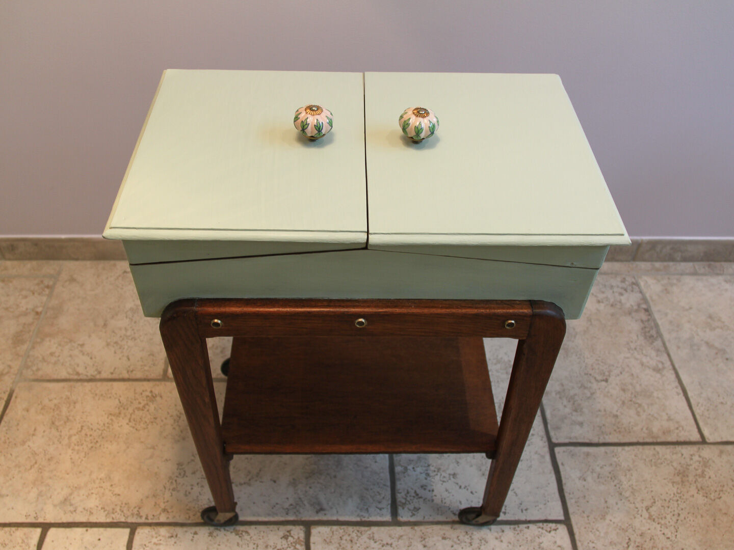 Worker green wood feet wheels