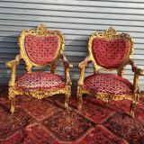 pair of gilded wooden ceremonial chairs