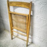 Folding chair with canne seat