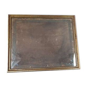 Frame with canals and pearl frieze, made of wood and stucco with gilding with orig gold leaf