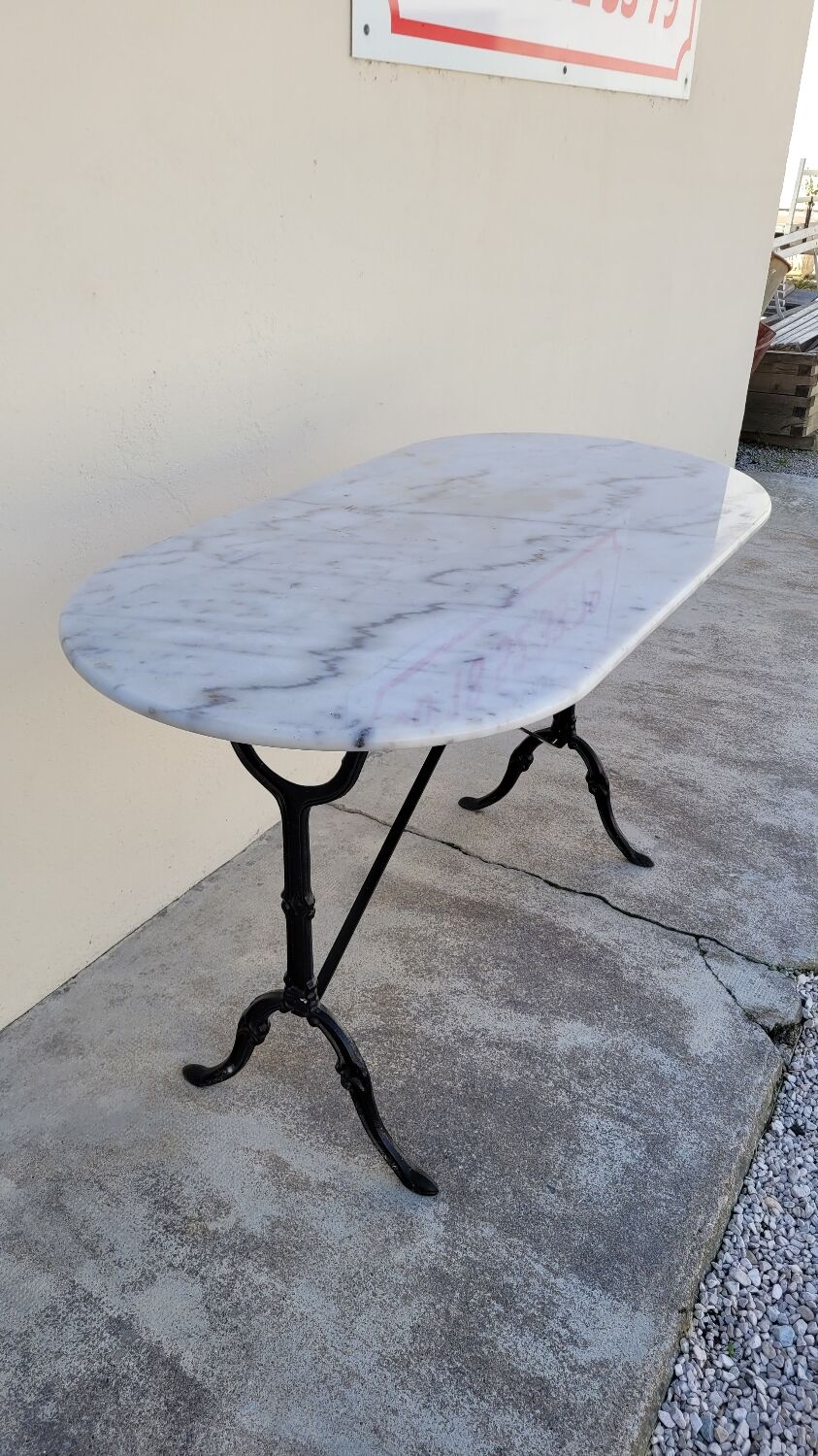 Cast iron bistro table and old oval marble top