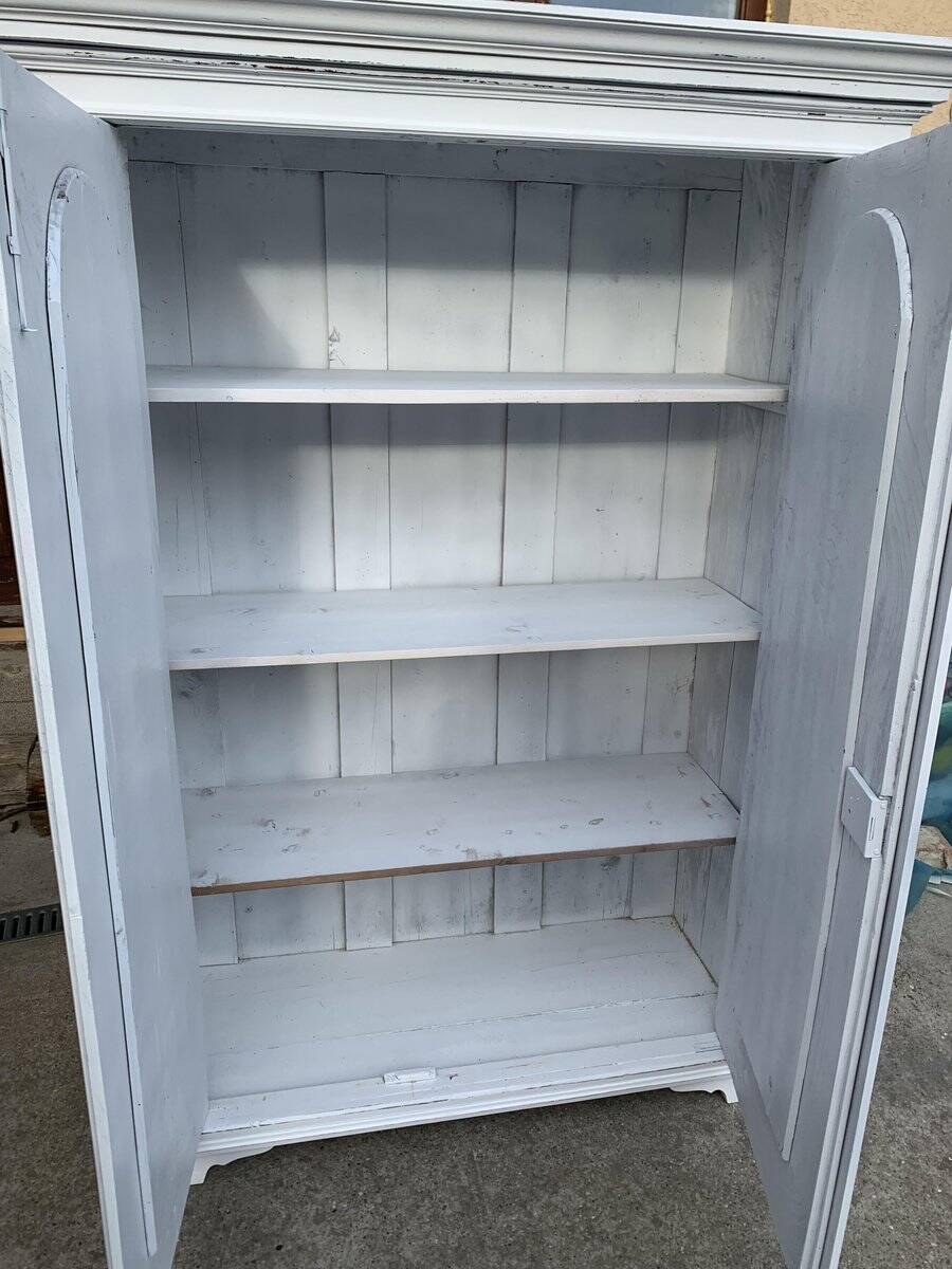 Vintage two-door wardrobe in painted white wood — late 19th century Hungarian style.