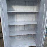 Vintage two-door wardrobe in painted white wood — late 19th century Hungarian style.