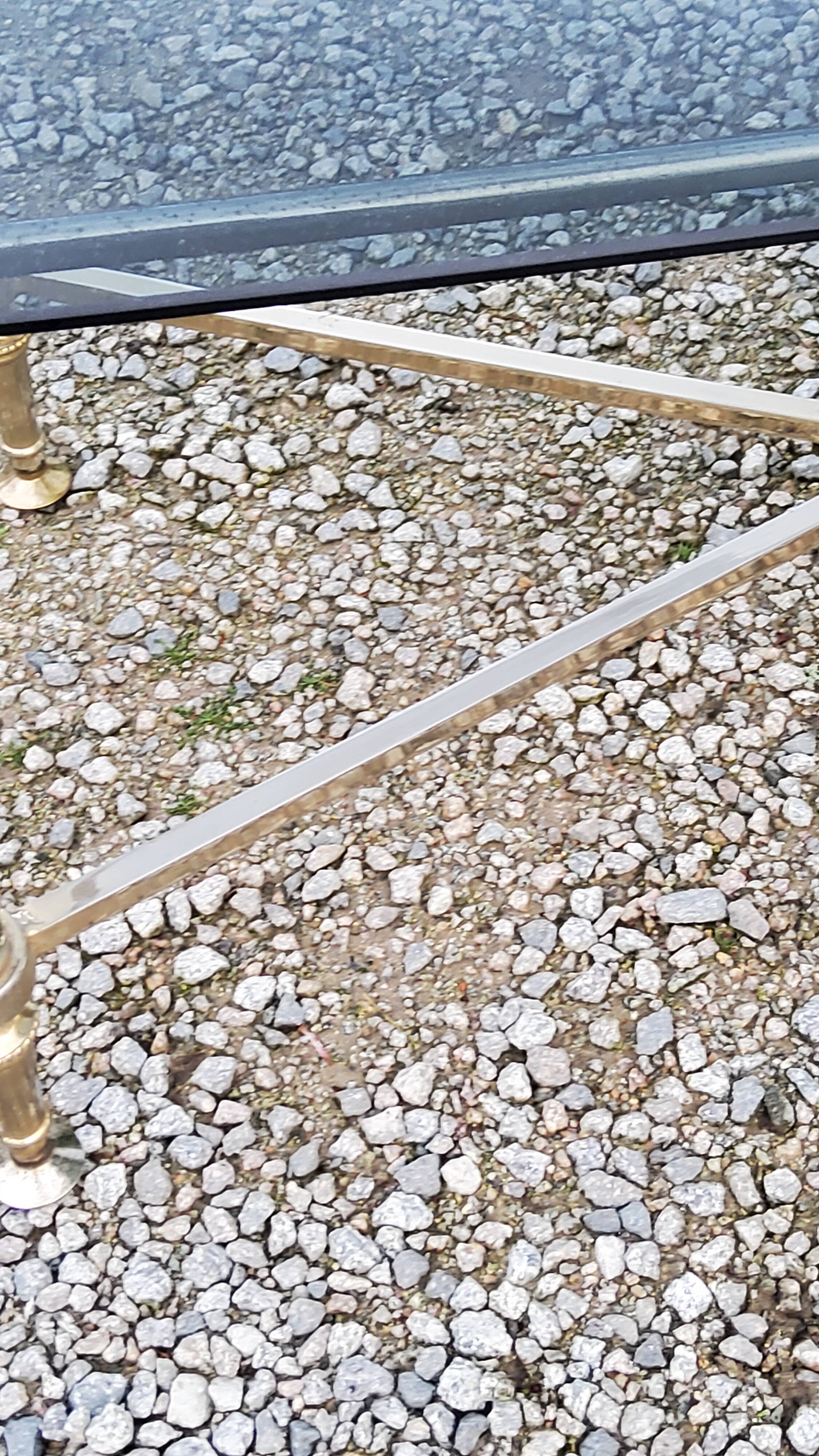 Coffee table of the 70s in neo-classical style gilded metal base and chrome smoked glass top