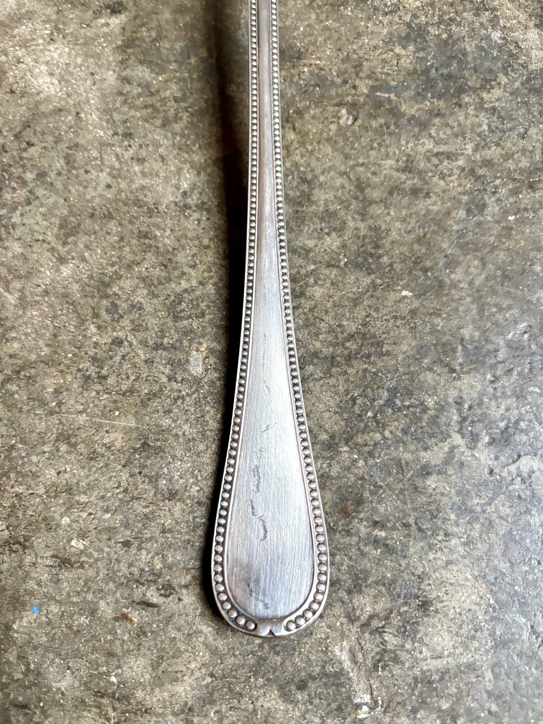 Silver-plated metal ladle, beaded decoration no. 2