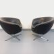 Pair of vintage Scandinavian swivel armchairs in faux leather and chrome.