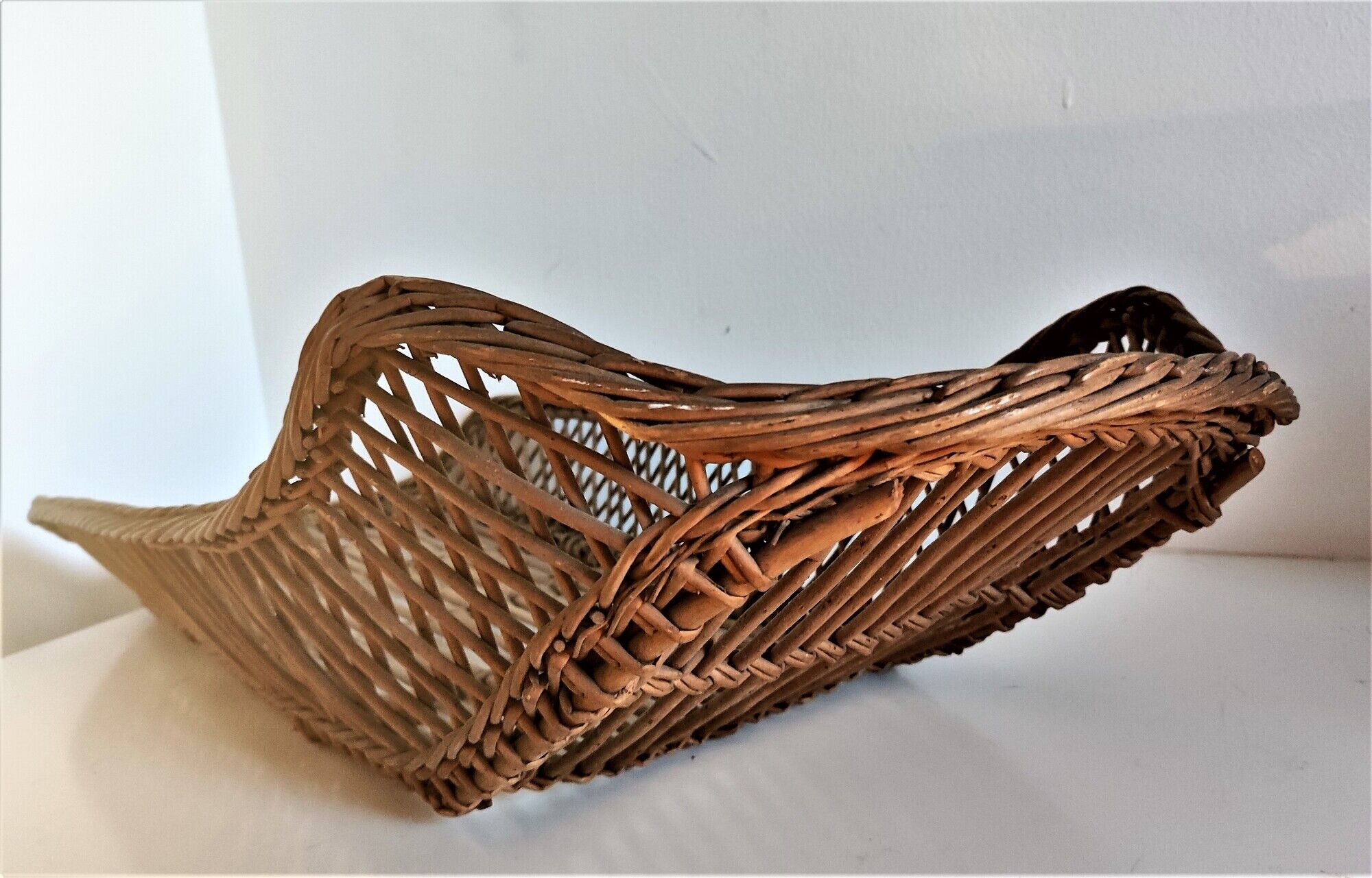 Rattan wicker woven bamboo bassinet or vintage bread pan