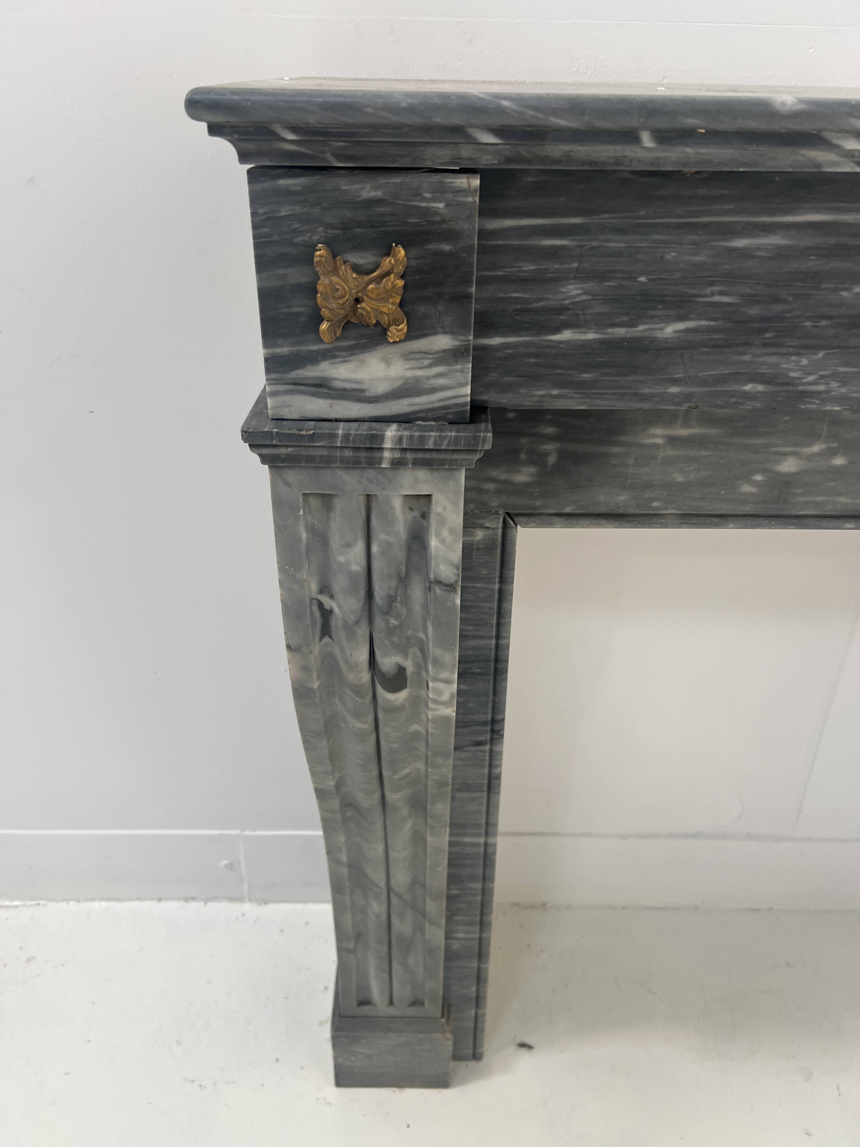 Napoleon III fireplace in blue Turquin marble from the 19th century.
