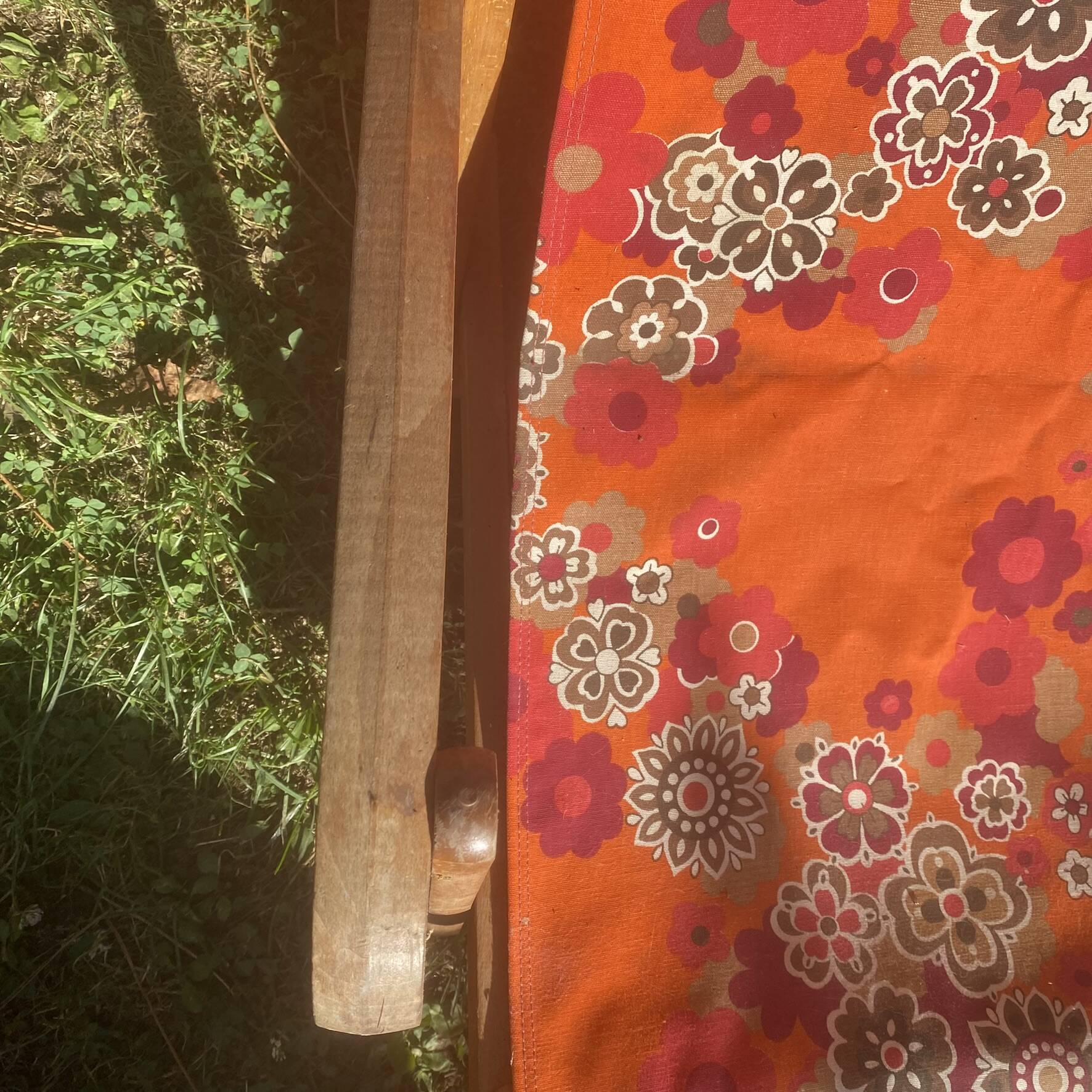 Vintage beach or garden chair made of wood and floral fabric, 1970s.