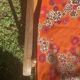 Vintage beach or garden chair made of wood and floral fabric, 1970s.