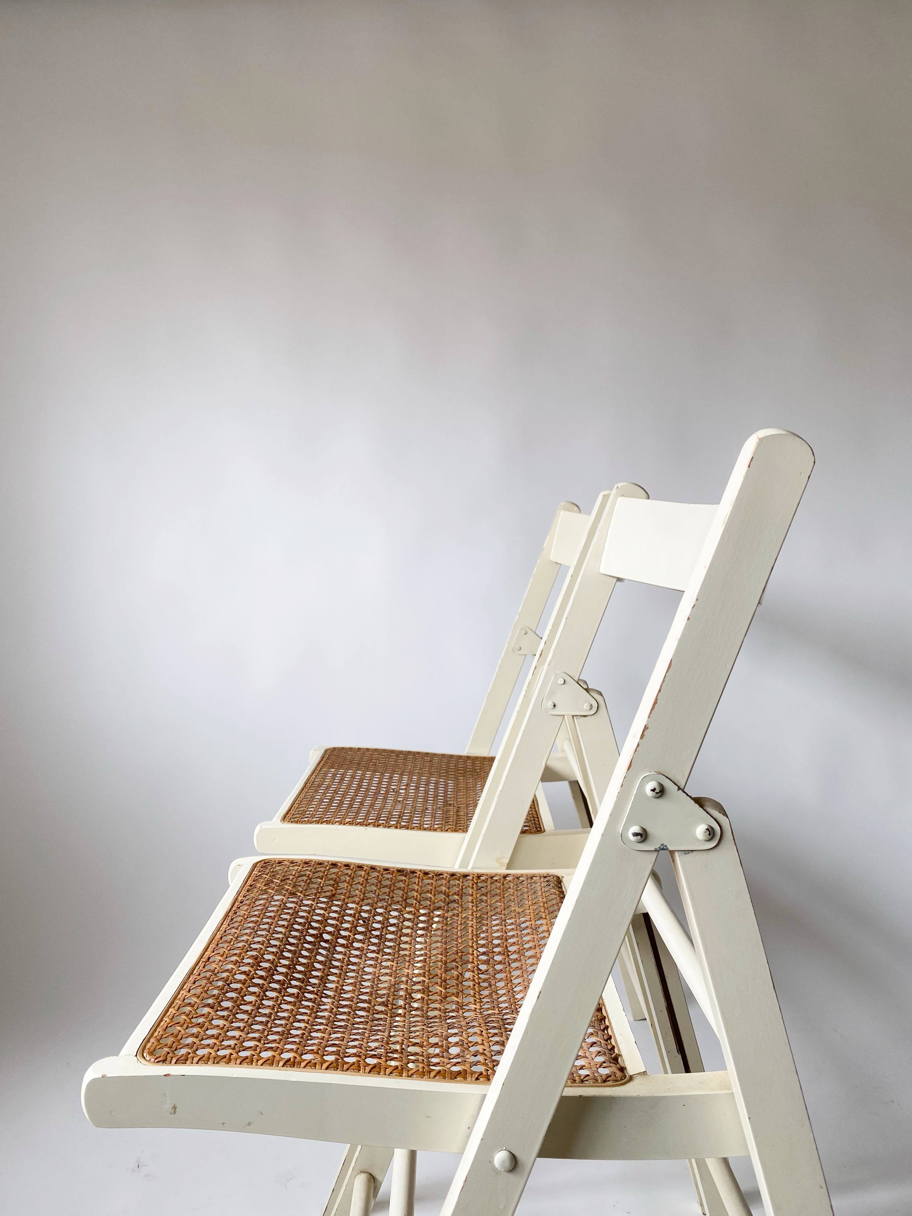 Pair folding chairs caning