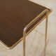 Vintage gold metal magazine rack