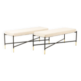 Pair of white benches, in lacquered and gilded metal. 2000s.