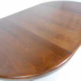 Expandable round teak table