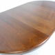 Expandable round teak table
