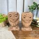 Pair of wooden "owl" candlesticks