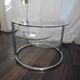 Glass coffee table with swivel tops circa 1980