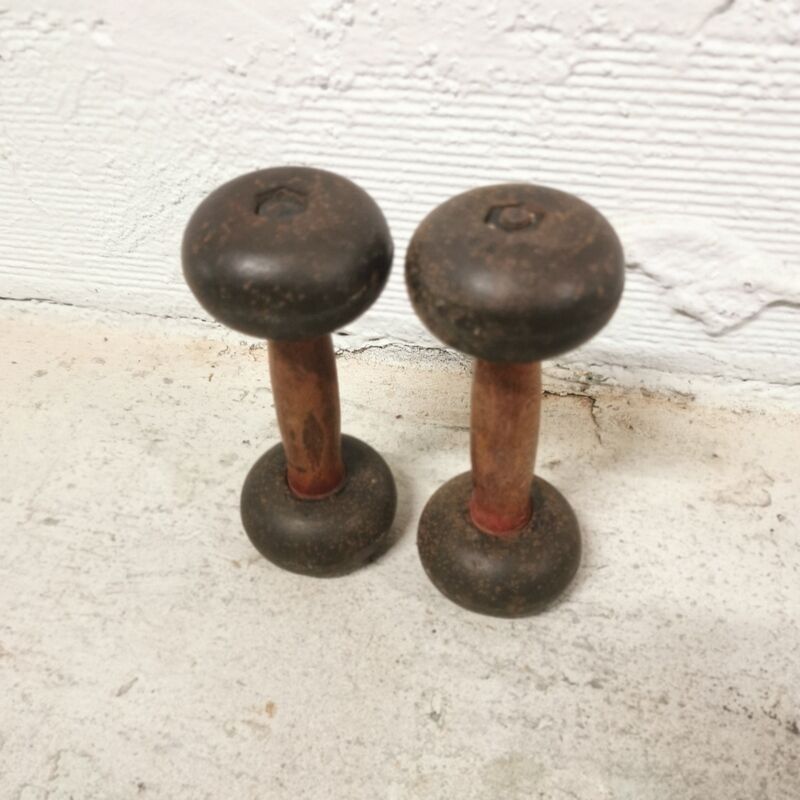 Pair of vintage dumbbells in cast iron and wood