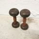 Pair of vintage dumbbells in cast iron and wood