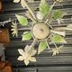 Small vintage cream metal flower chandelier with orange flowers and 3 arms.