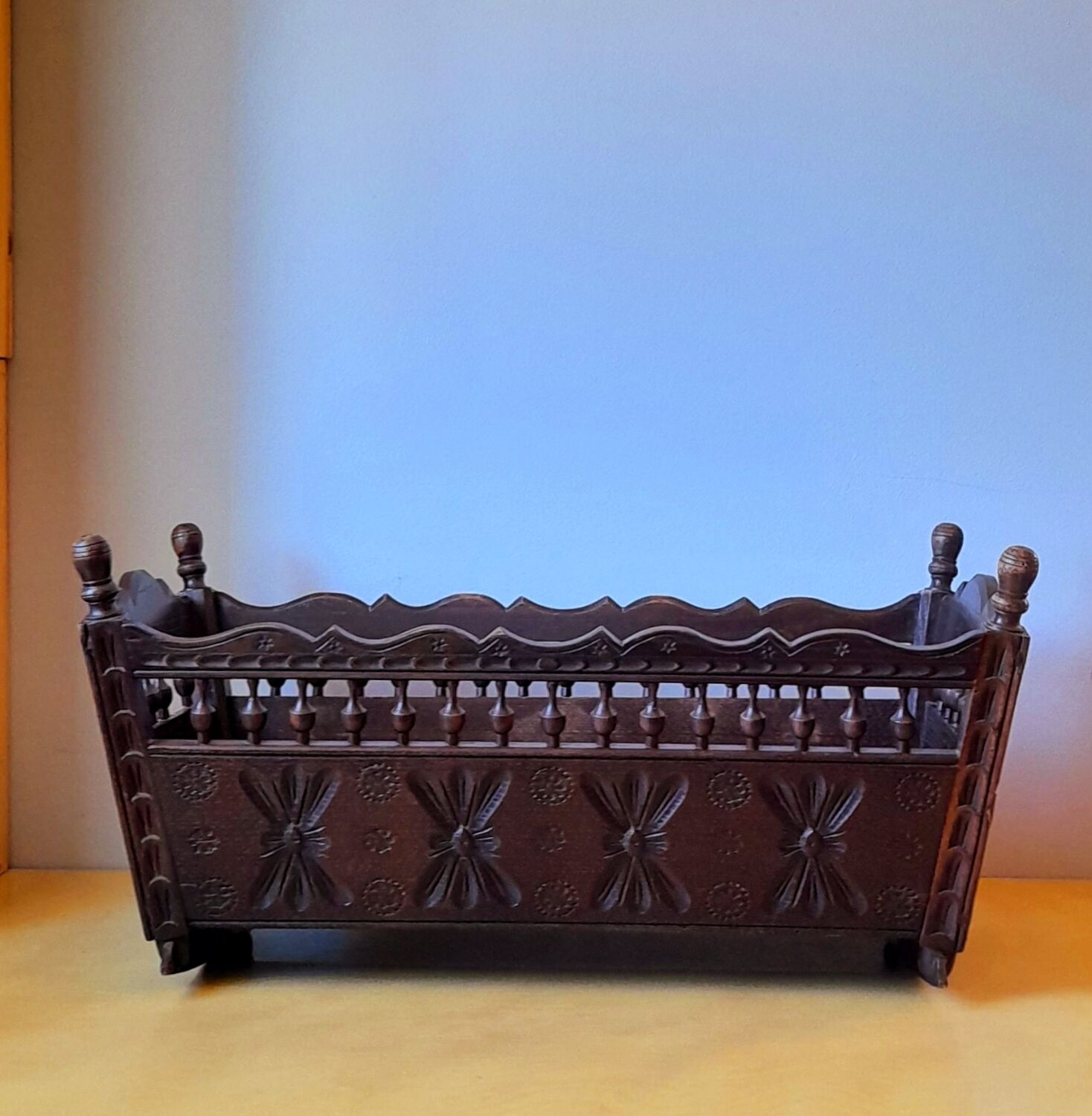 Carved wooden dolls cradle 1900