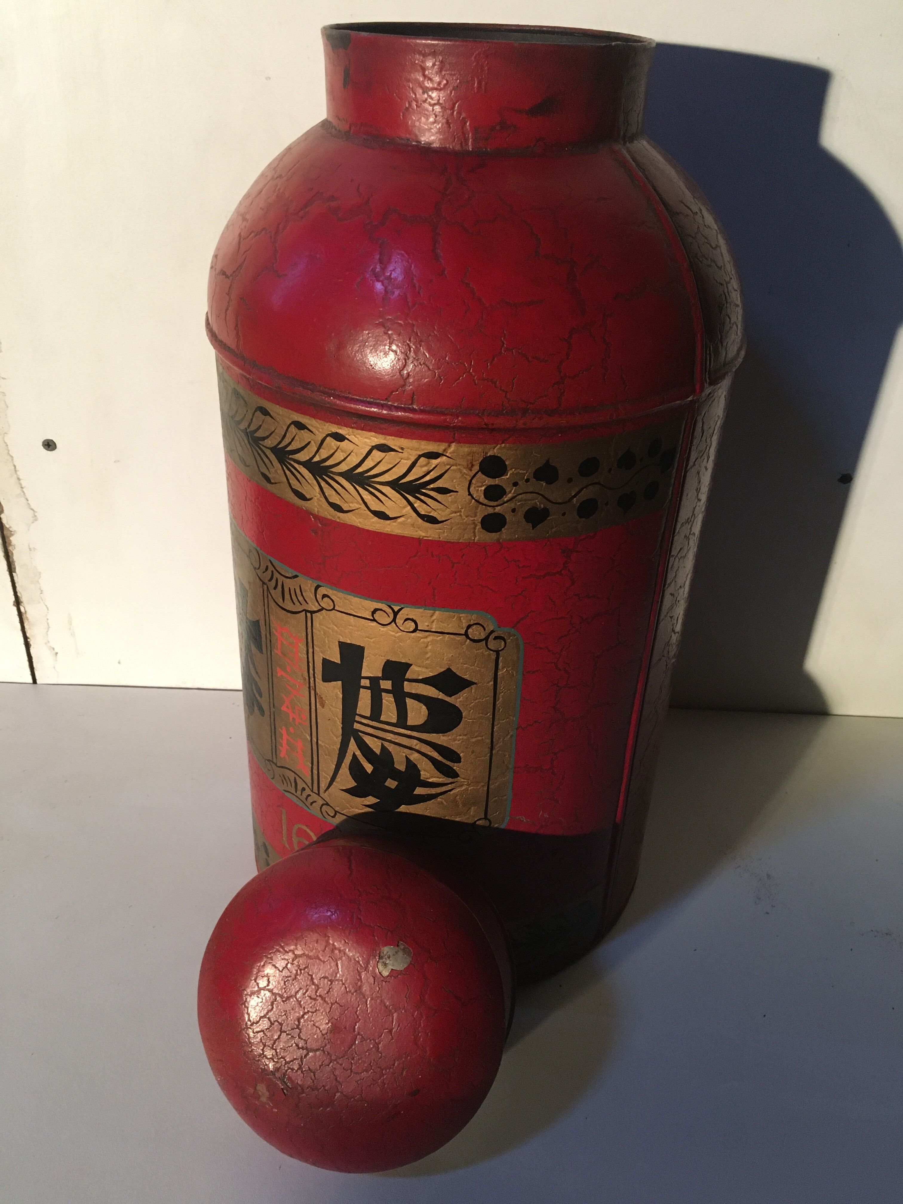 Asian red metal pot with lid