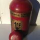 Asian red metal pot with lid