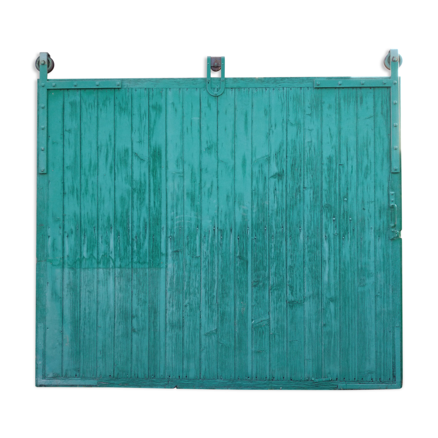 Old wooden door with pulley