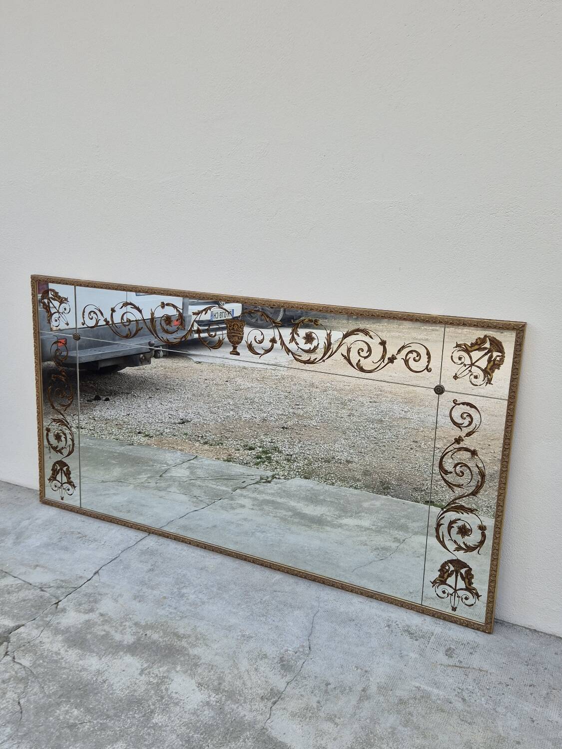Antique gilded Venetian brasserie mirror in eglomised glass