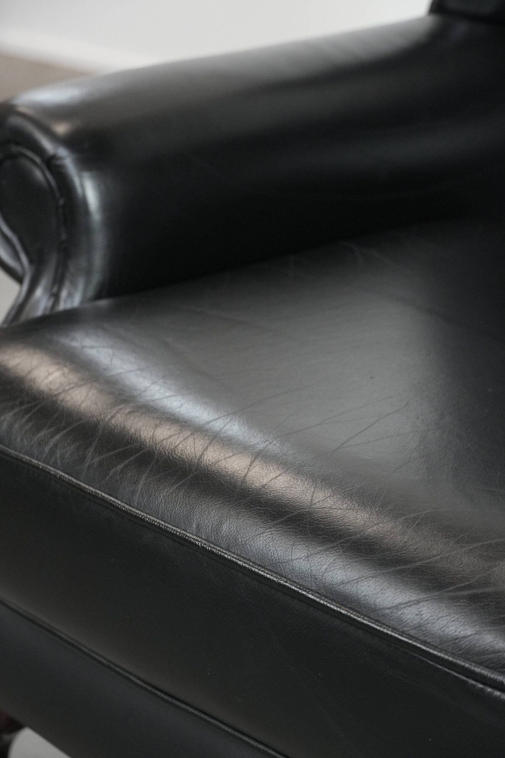Black cowhide leather Chesterfield wingback chair in English style