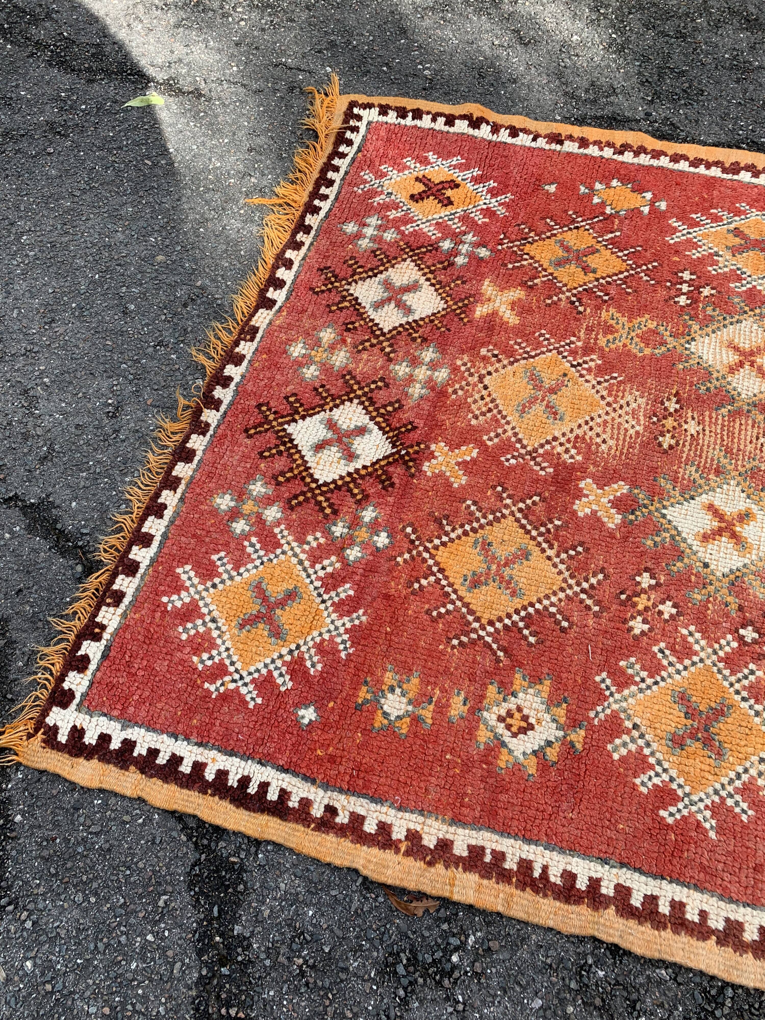 Old orange kilim carpet