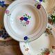 Set of 10 mismatched vintage soup plates