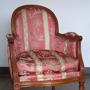 Pair of Louis XVI style armchairs in walnut and pink silk and ecru
