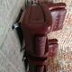 Couple de fauteuil en simili cuir rouge bordeaux, annees 70