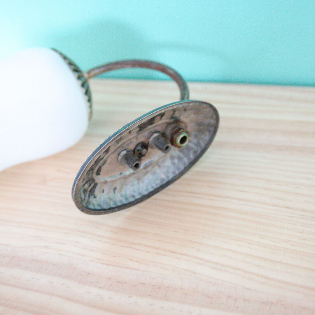 Metal wall lamp and serrated glass globe