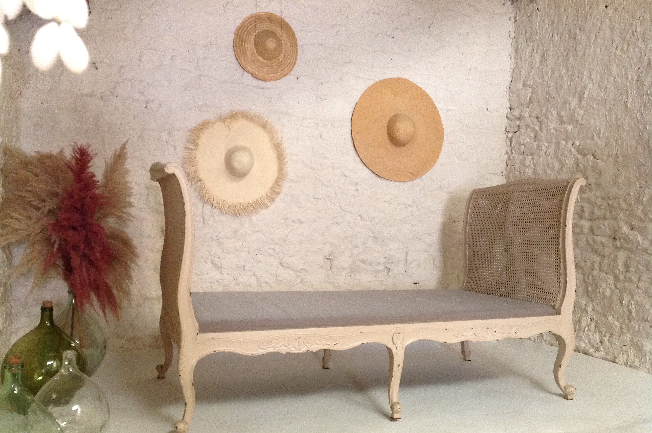 Carved wooden bench and caning bed