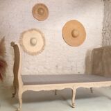 Carved wooden bench and caning bed