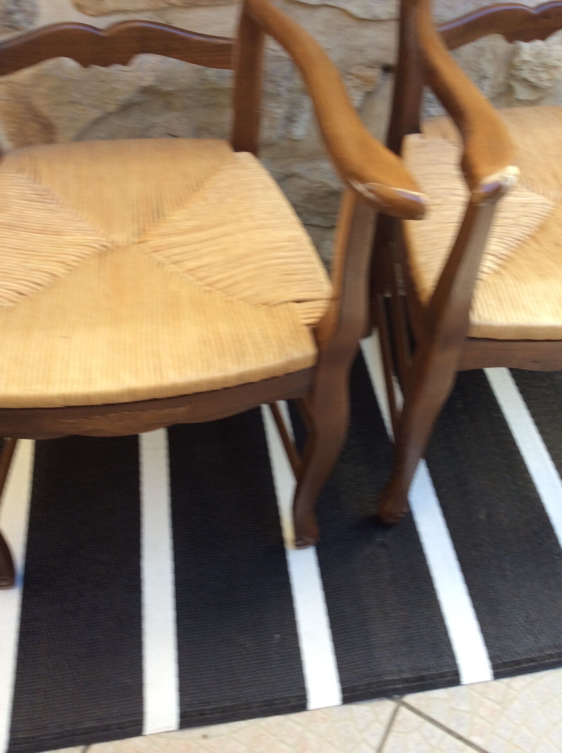 Pair of straw seating armchairs