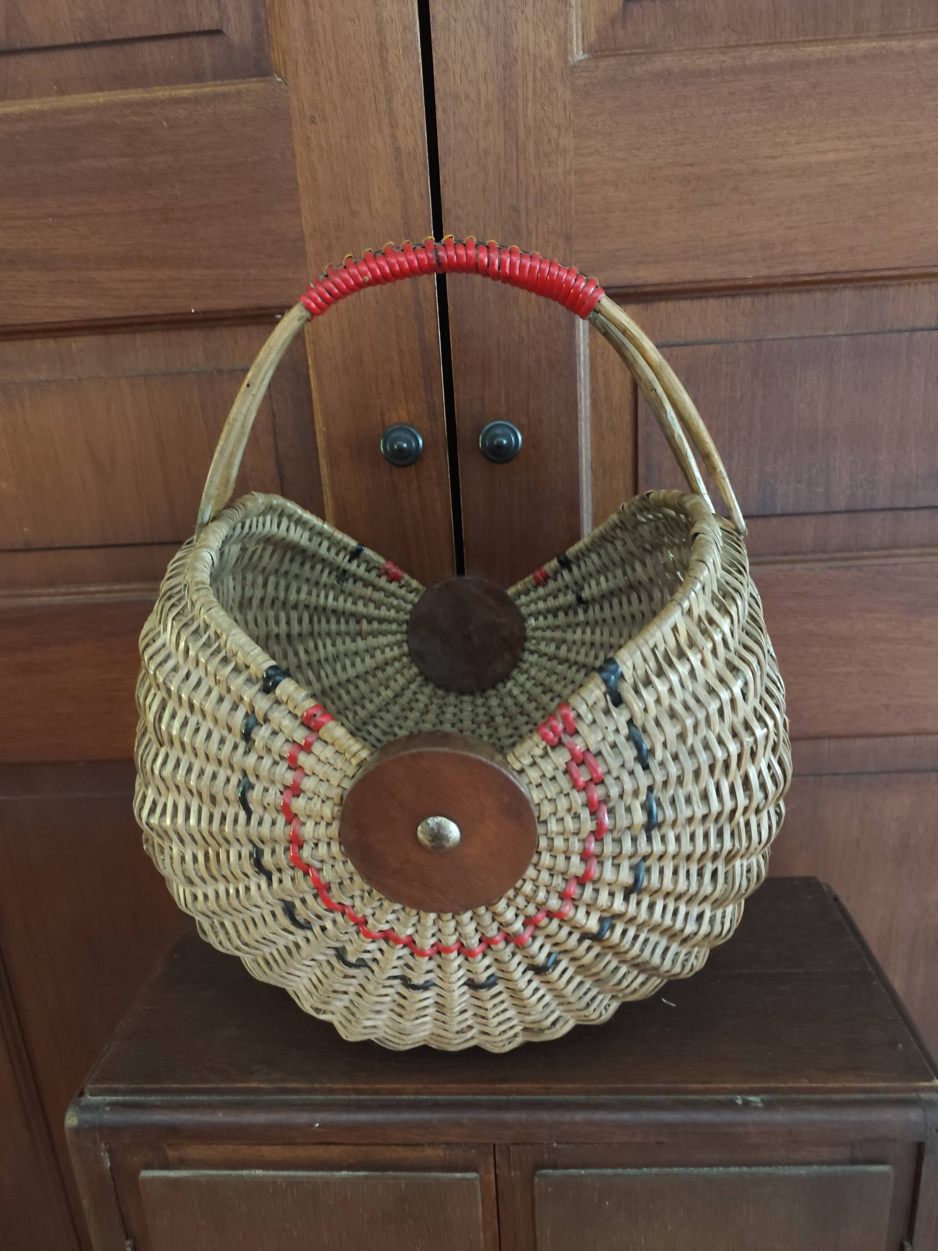 Large antique half-moon rattan basket