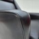 1970s, Danish highback armchair, black artificial leather, teak wood legs.