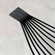 Minimalist black steel wire fruit bowl from the 1950s.