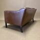 Scandinavian design 2-seater leather sofa.