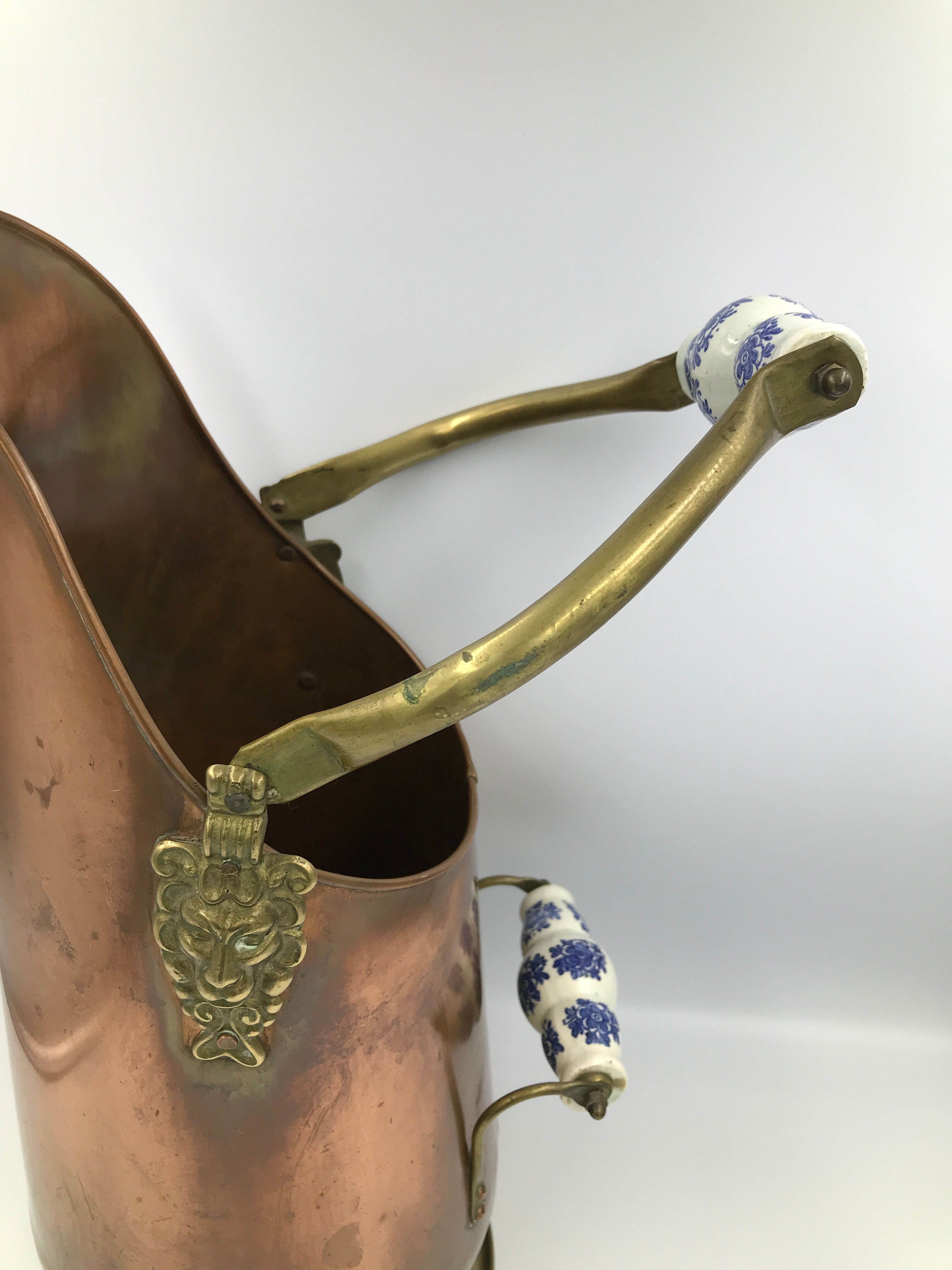Copper umbrella holder and vintage porcelain handles