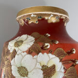 Pair of antique vases with butterfly and flower motif.