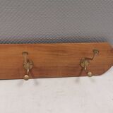 Coat rack in teak and brass. Denmark 1970-80s