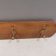 Coat rack in teak and brass. Denmark 1970-80s