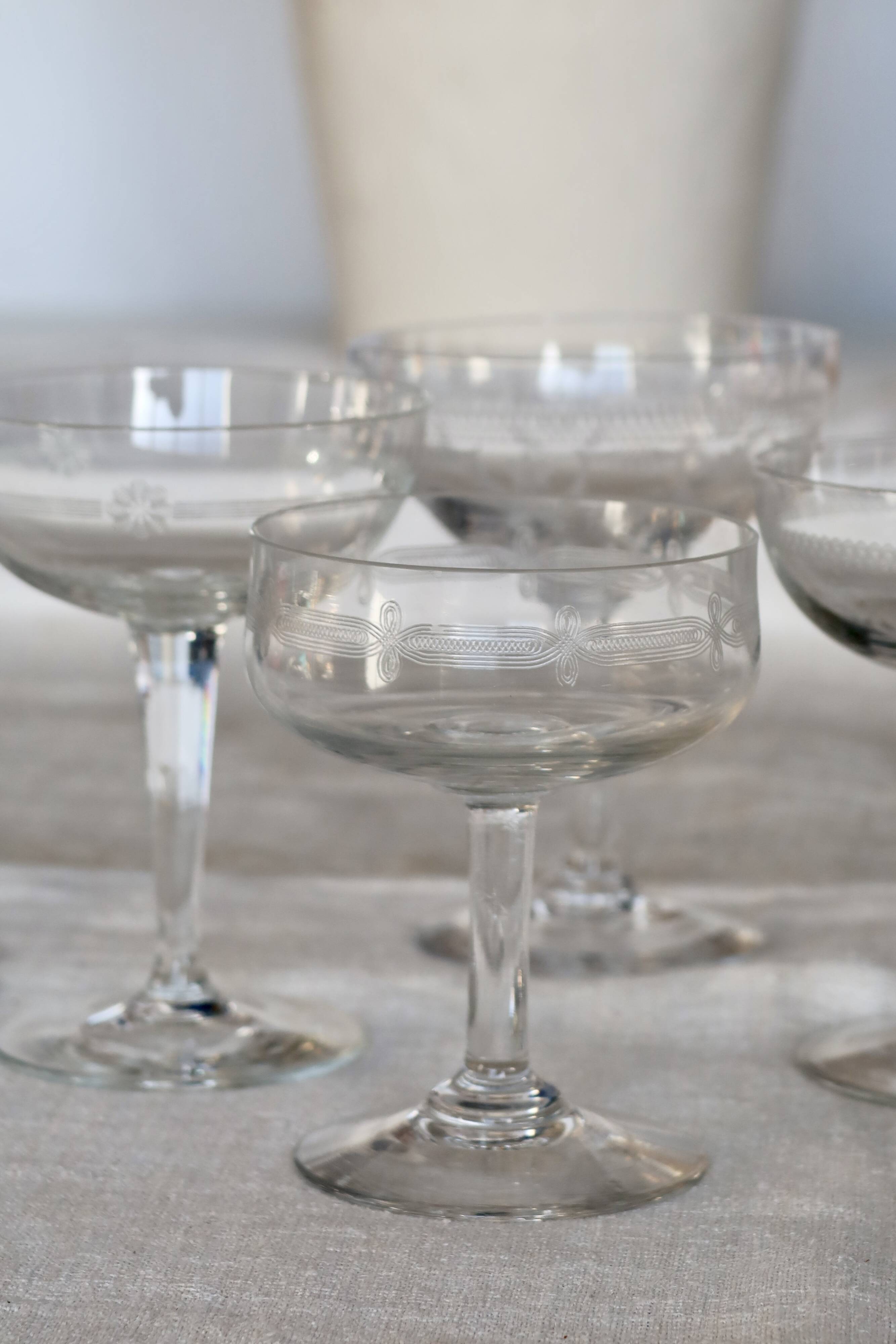 Mismatched vintage cut crystal champagne glasses
