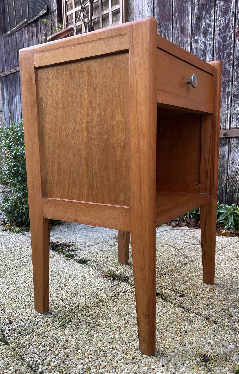 Wooden bedside table, warm tones, vintage, 1950s.